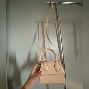 Cute little crossbody purse.